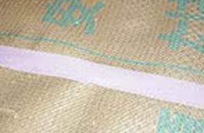 養生紙の波打ちを押さえるためにNo.395Nを使用している施工例